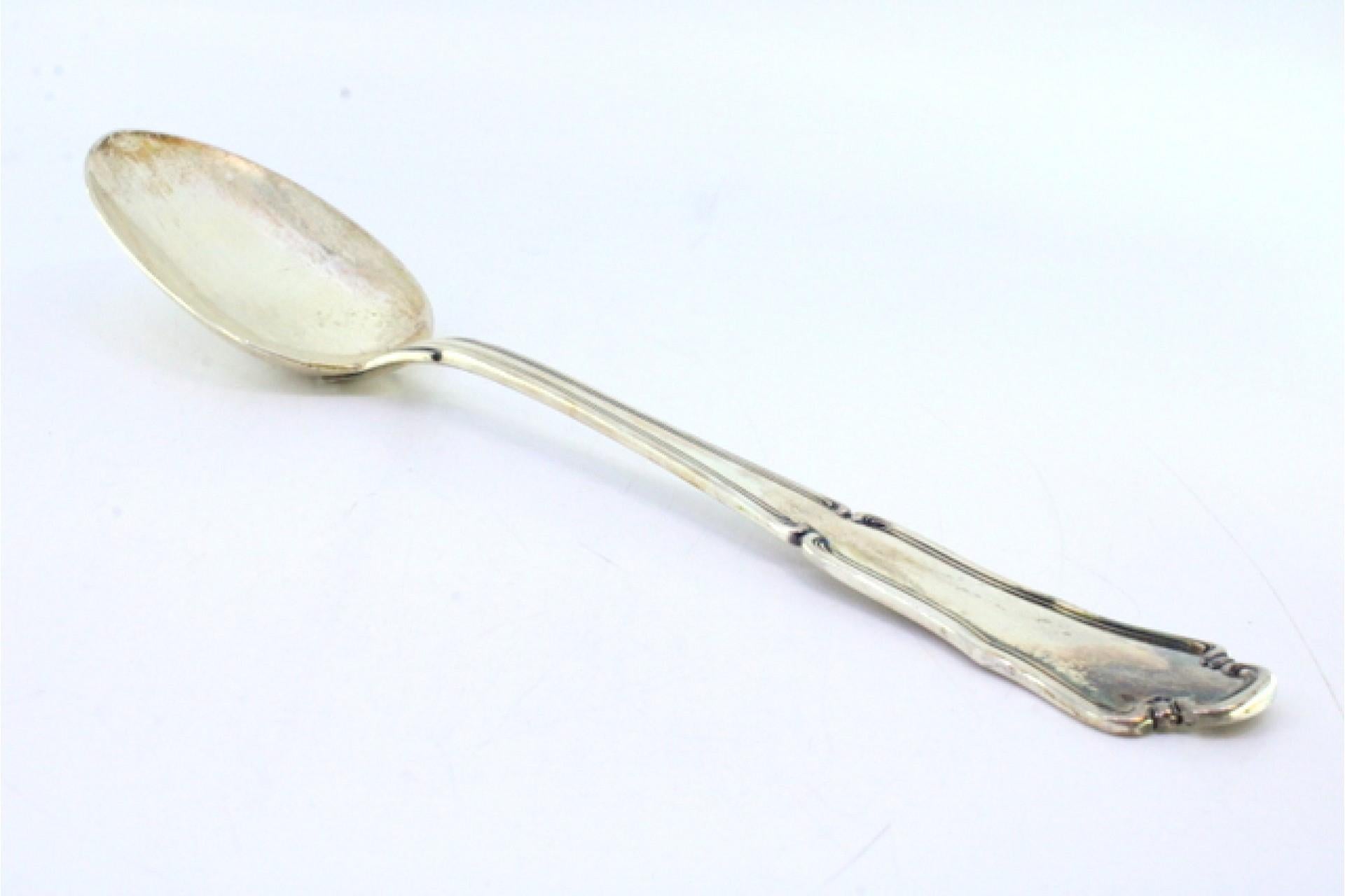 Silver rice and serving spoon with a long, scalloped handle en venta 2