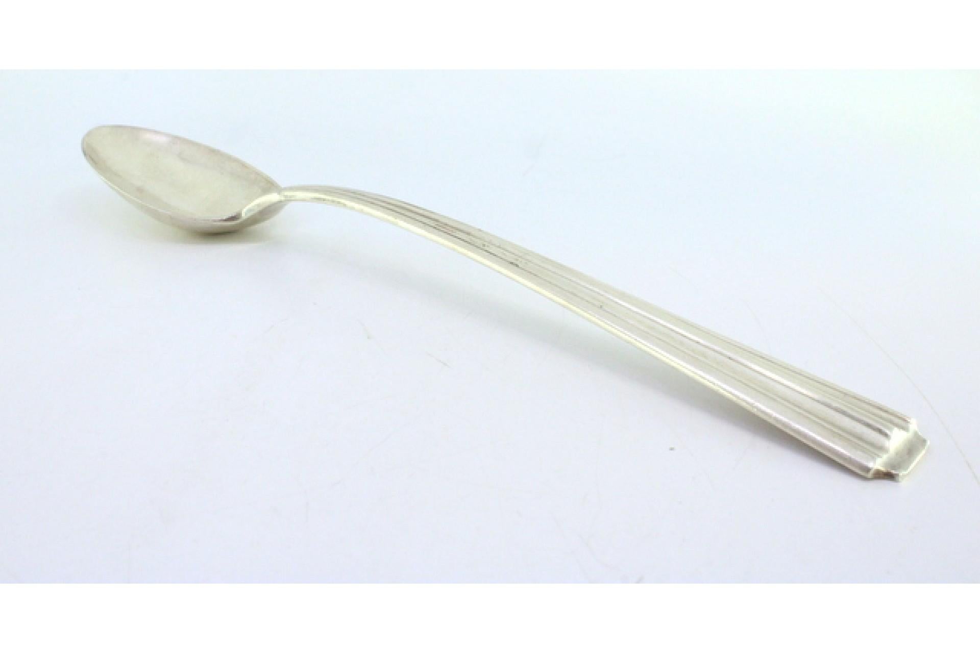 Silver rice and serving spoon with fluted handle siglo XX en venta