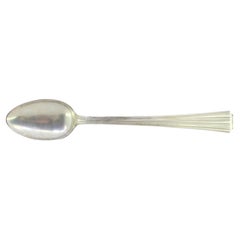 Silver rice and serving spoon with fluted handle
