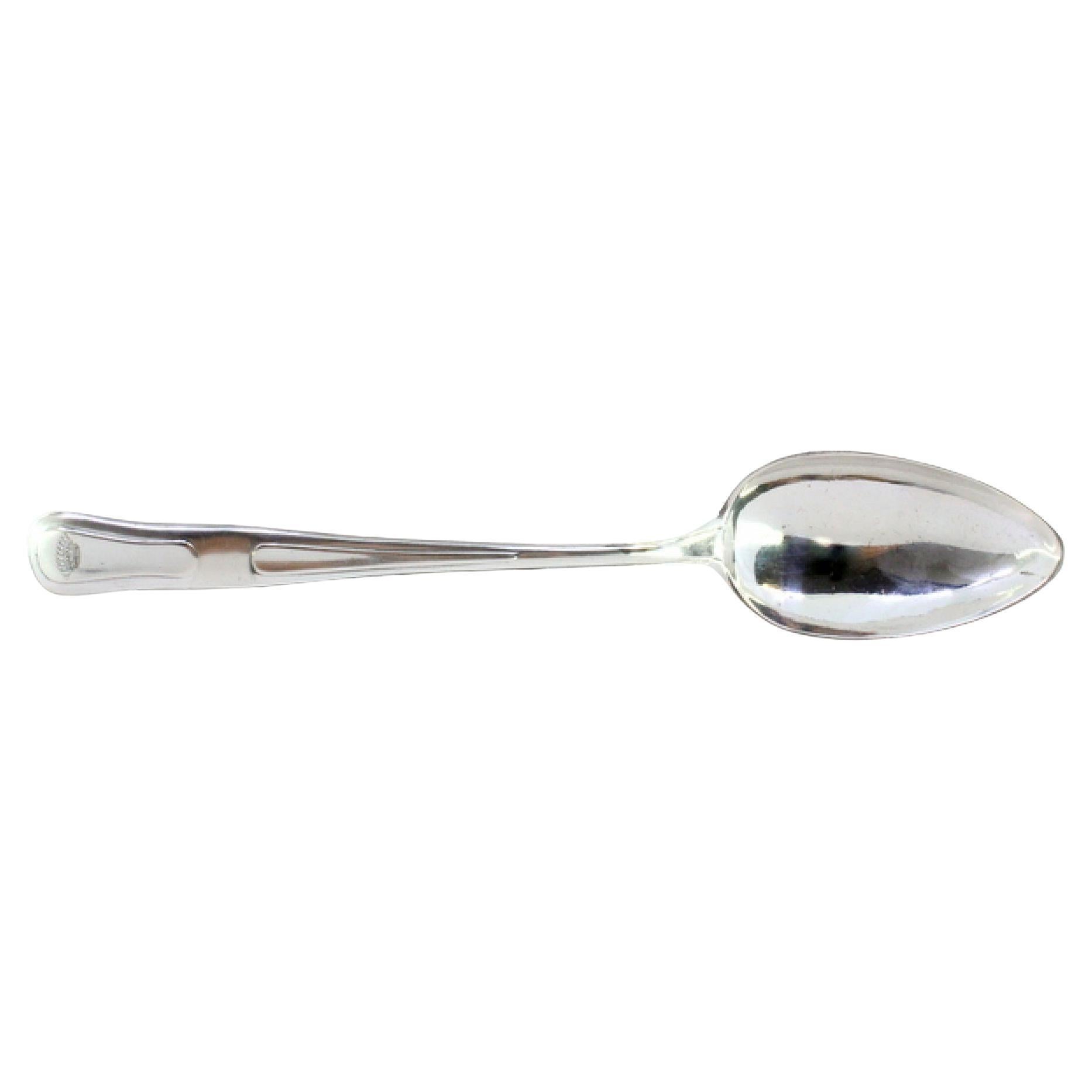 Silver rice and serving spoon with friezes and a crown engraved on the handle