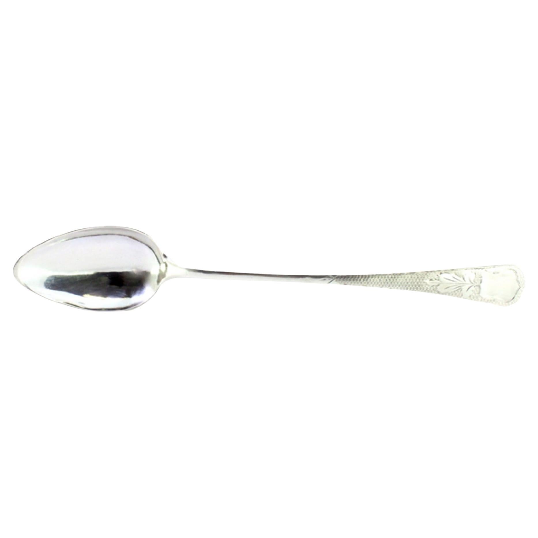 Silver rice and serving spoon with guilloche handle and monogram plaque