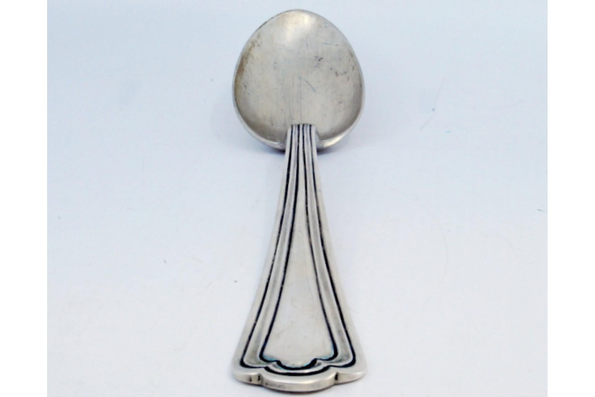 Silver rice and serving spoon with raised grooves along the handle en Bueno estado para la venta en Porto, PT