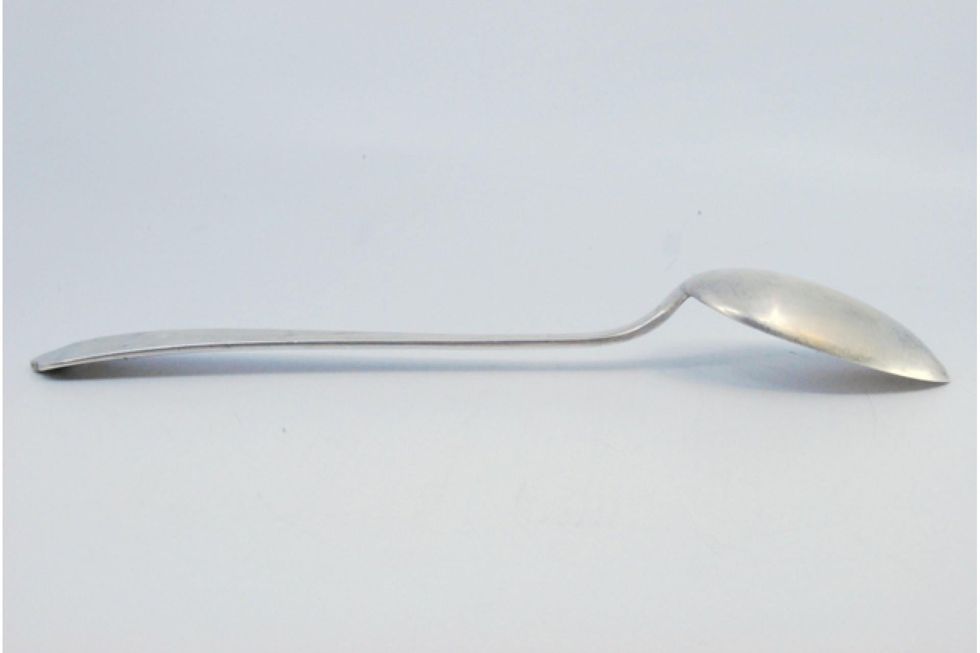 Silver rice and serving spoon with raised grooves along the handle siglo XX en venta