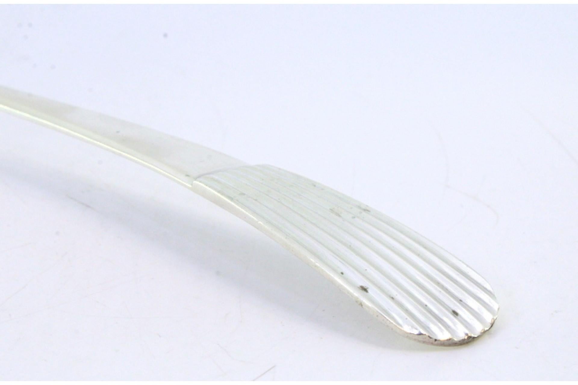 Silver rice and serving spoon with reed-style reliefs on the handle en Bueno estado para la venta en Porto, PT