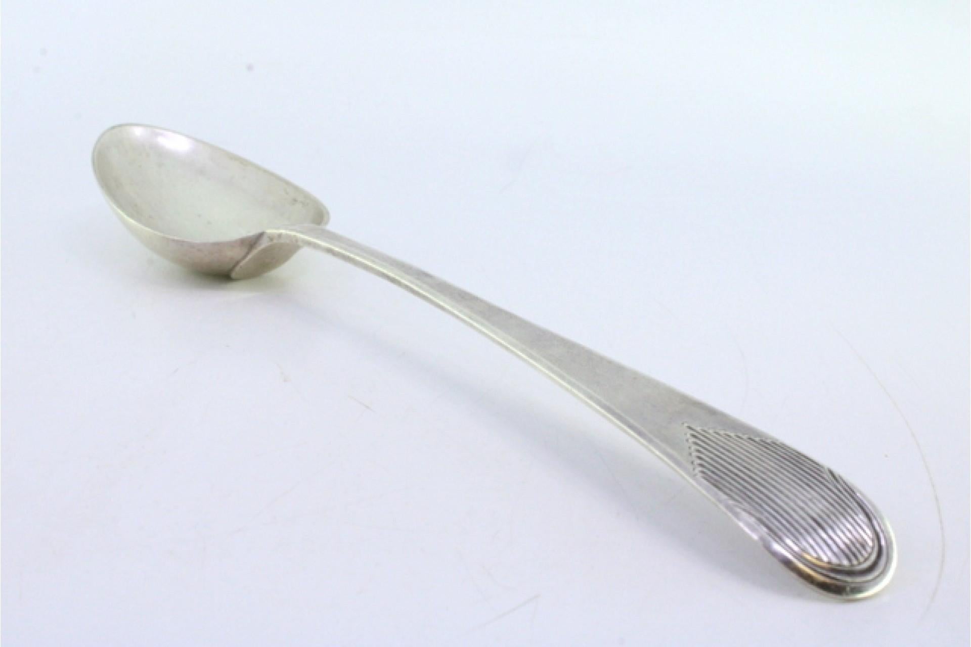 Silver rice and serving spoon with reliefs and grooves on the handle en Bueno estado para la venta en Porto, PT