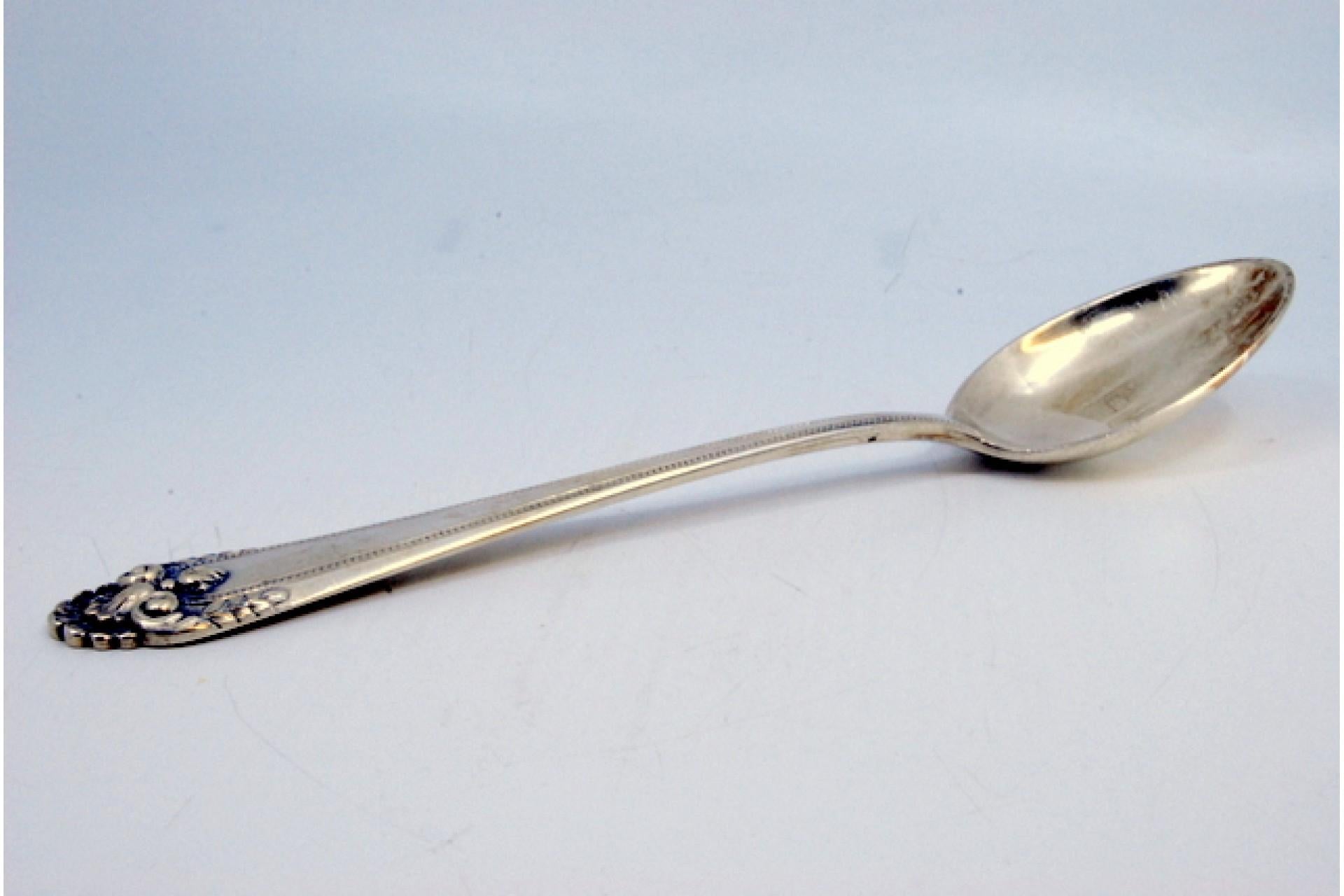 Silver rice and serving spoon with shell shape on the handle en venta 2