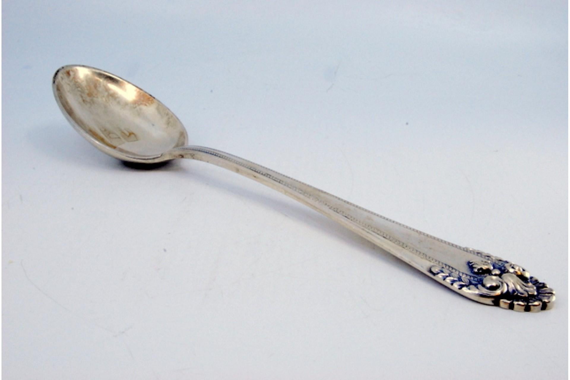 Silver rice and serving spoon with shell shape on the handle en venta 3