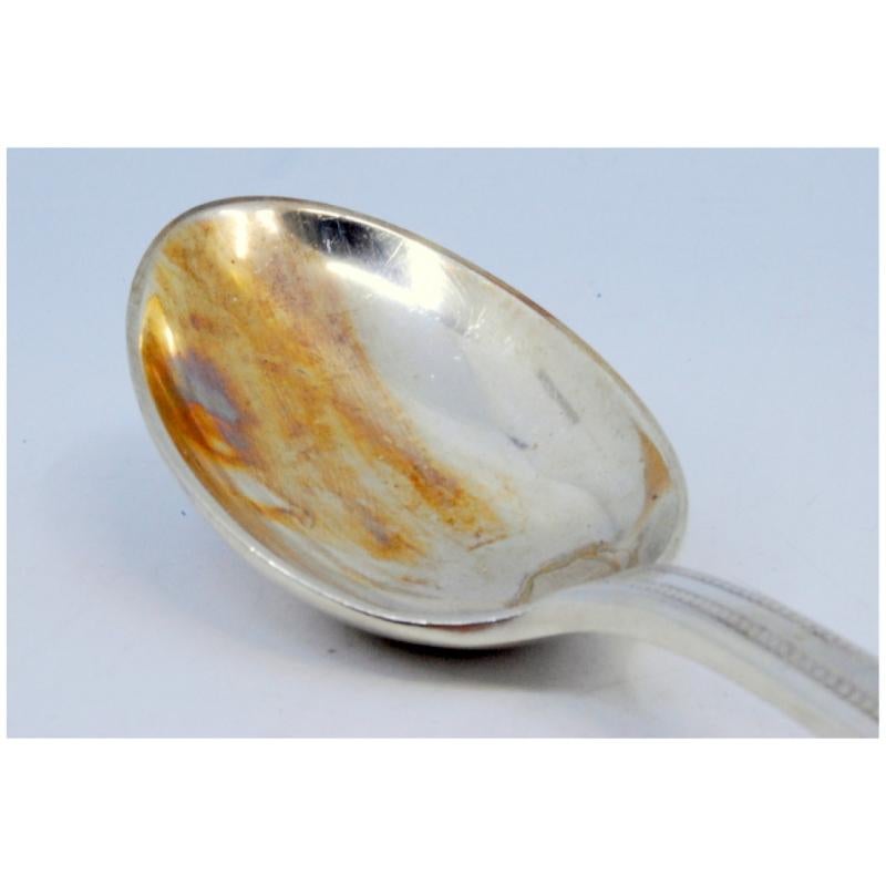 Silver rice and serving spoon with trim and shell shape on the handle en Bueno estado para la venta en Porto, PT