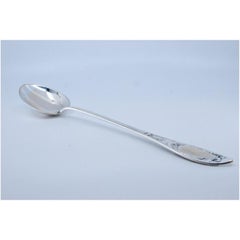 Silver rice & serving spoon w/ floral motifs along the handle & a monogram card