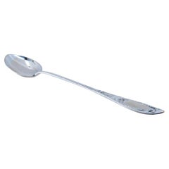 Silver rice & serving spoon w/ floral motifs along the handle & a monogram card