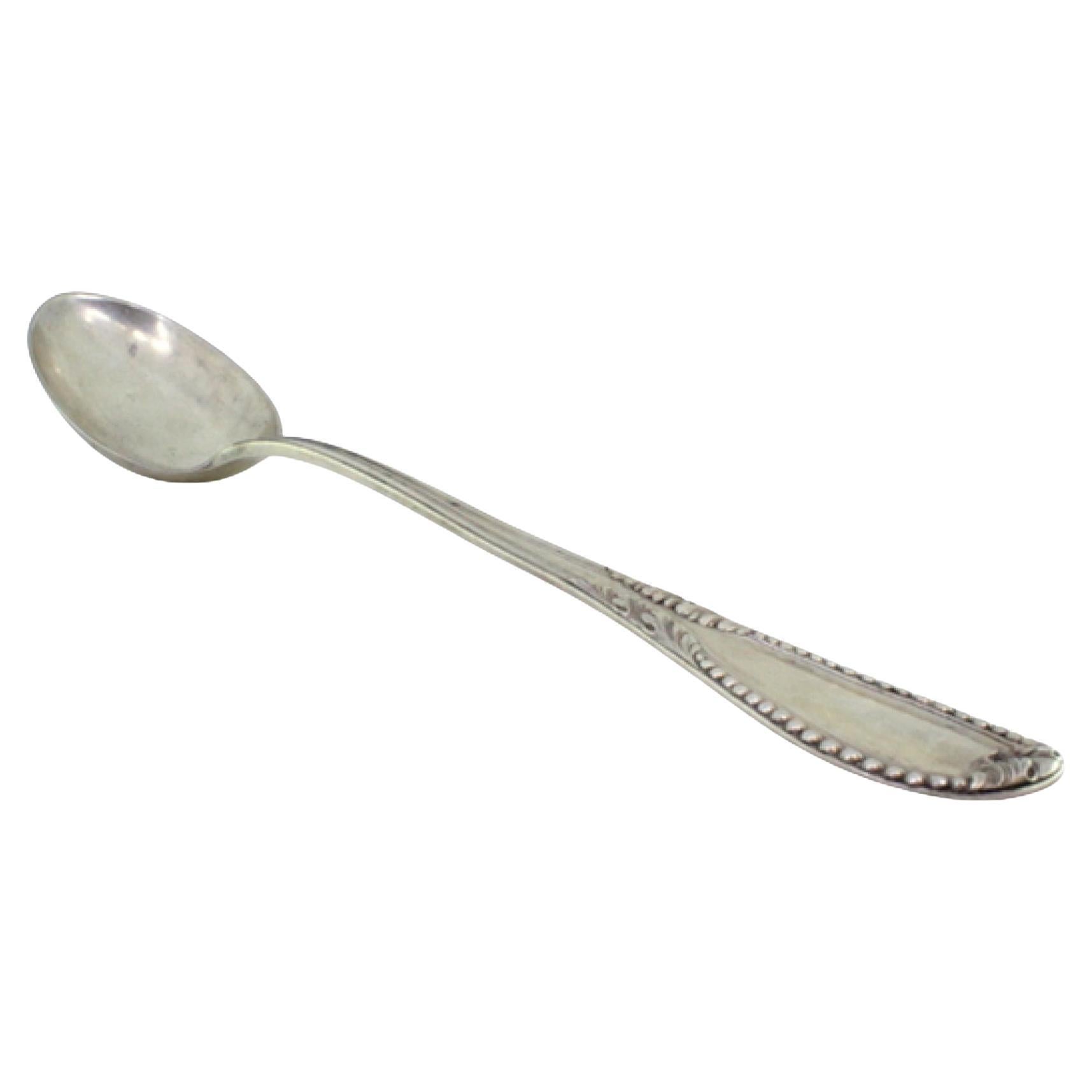 Silver rice/serving spoon with friezes, pearled reliefs, acanthus leaves
