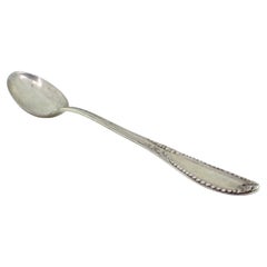 Silver rice/serving spoon with friezes, pearled reliefs, acanthus leaves
