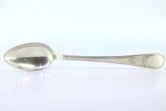 Silver rice/serving spoon with grooved handle and monogram plate