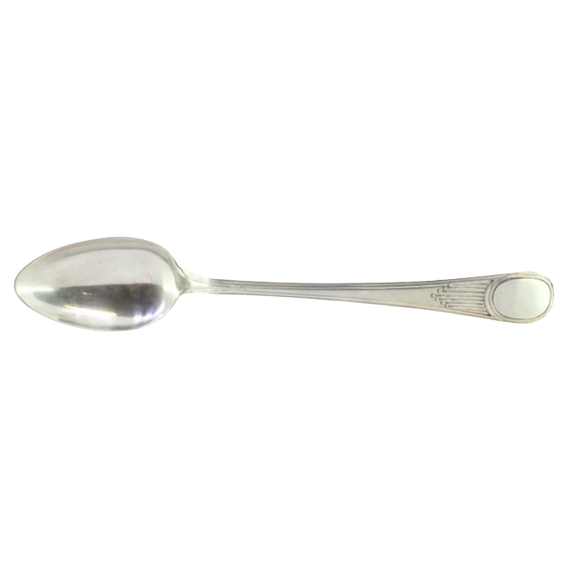 Silver rice/serving spoon with grooved handle and monogram plate