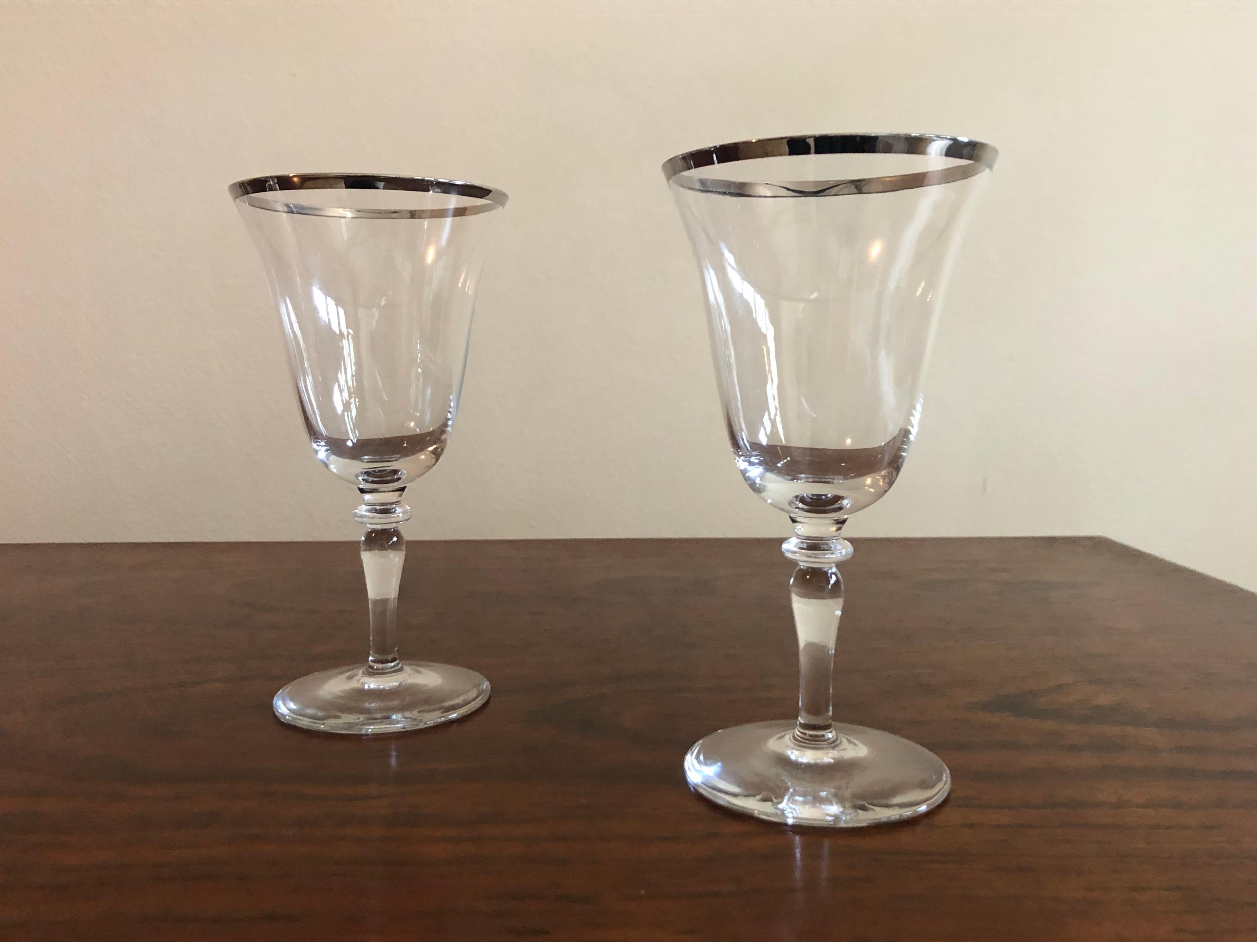 Set of 10 silver rimmed wine glasses in the style of Dorothy Thorpe. Its very rare to have a large set of these!