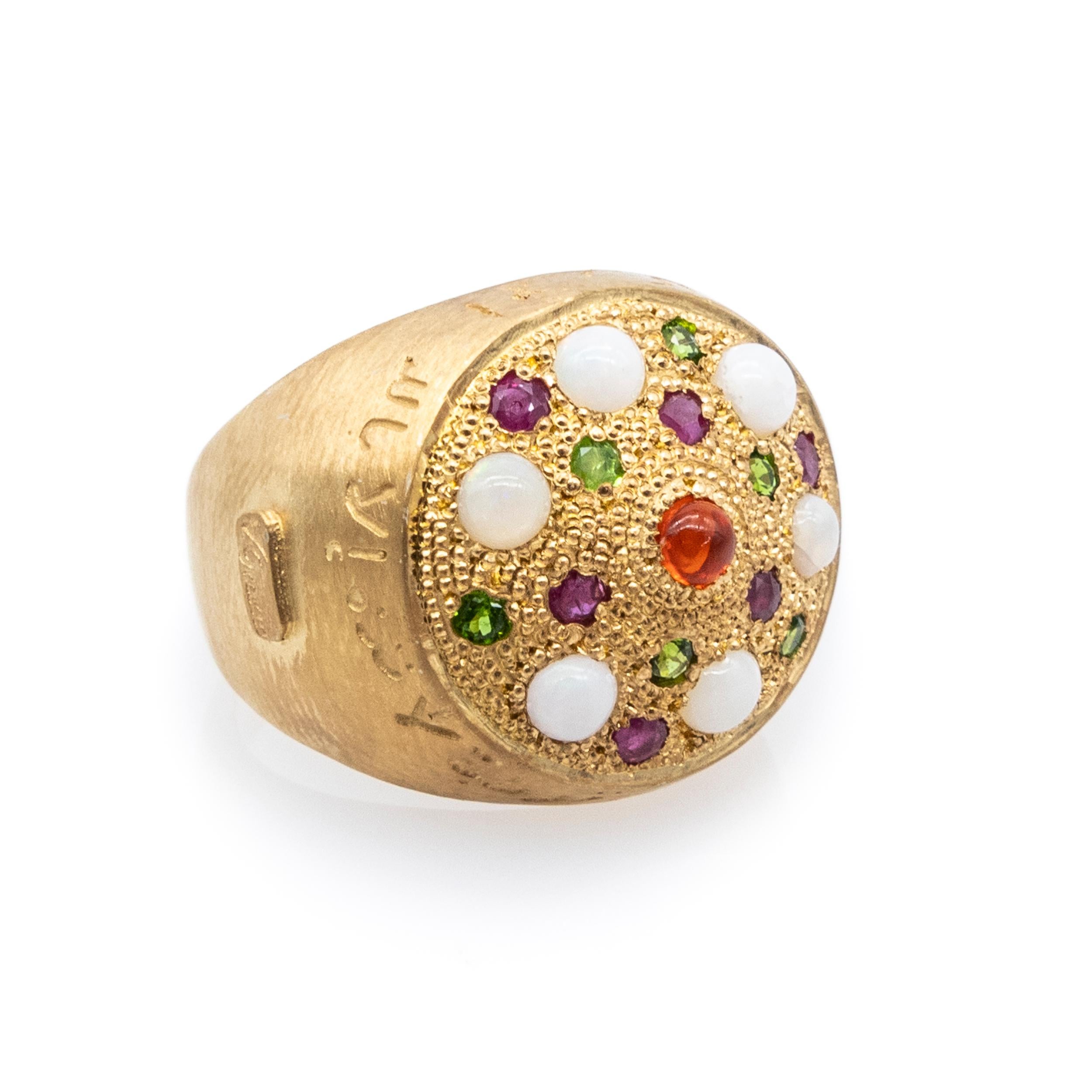Silver Ring Gold Plating White Opals Red Fire Opal Emeralds Rubies

Silver ring with yellow gold plating, white cabochon-cut opals, central red fire opal cabochon, emeralds, and rubies.

Behold the exquisite allure of this captivating ring—a