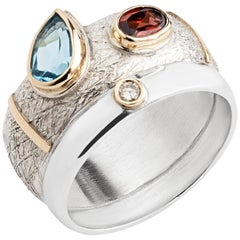 Silver Ring with 14 Karat Gold, Diamond and Topaz