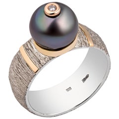 Silver Ring with Black Pearl "Secret" with Diamond and Gold Details