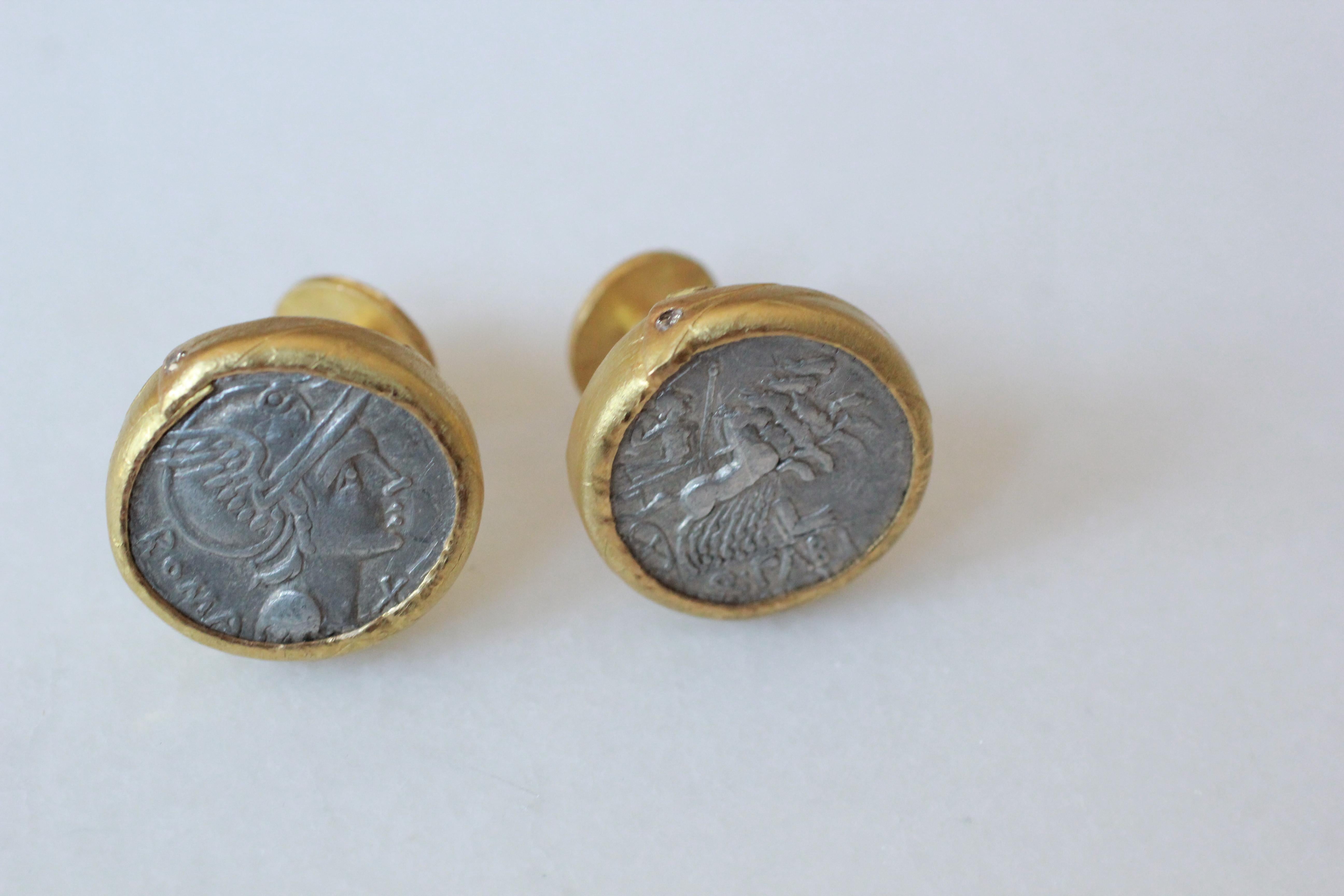 Coin cufflinks. Antique 2nd Cent BC Roman coins set in 21k gold bezels, styled with small diamond accents. Contemporary jewelry design by AB Jewelry NYC.

Bold and masculine While inspired by history, these elegant cufflinks are created today for a