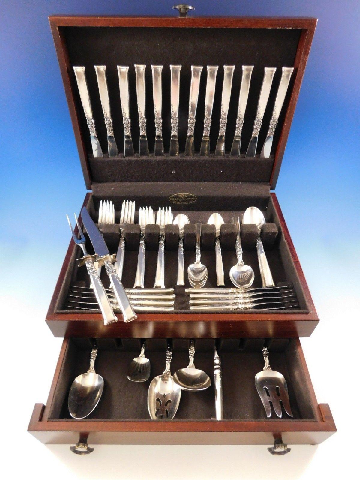 Lovely Silver Rose by Oneida sterling silver flatware set of 80 pieces. This set includes:

12 knives, 8 5/8
