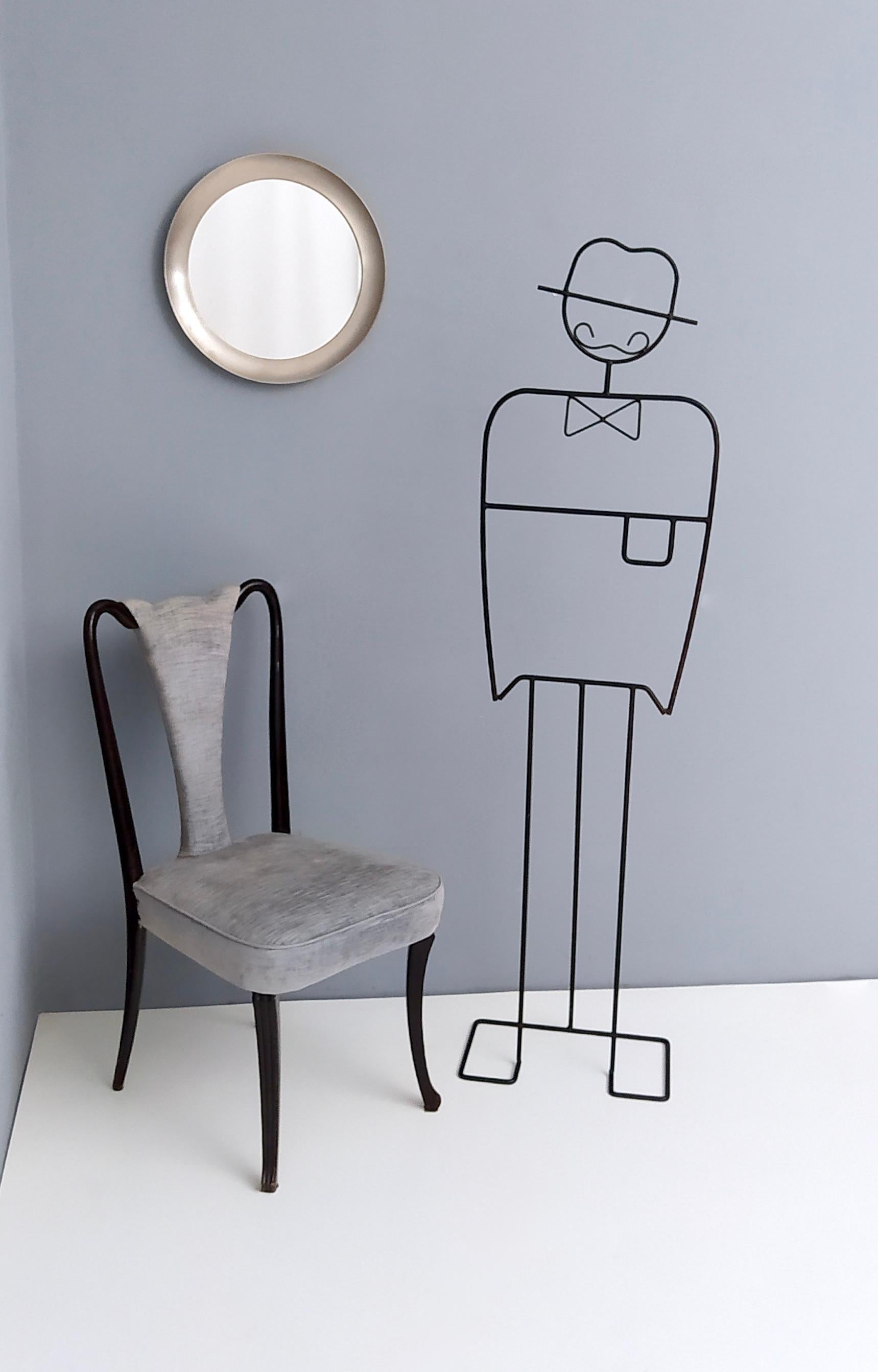 Made in Italy, 1950s. 
This mirror features a round steel frame and is rare for its dimensions. 
This is a vintage piece therefore it might show slight traces of use, but it can be considered as in very good original conditions and ready to become a