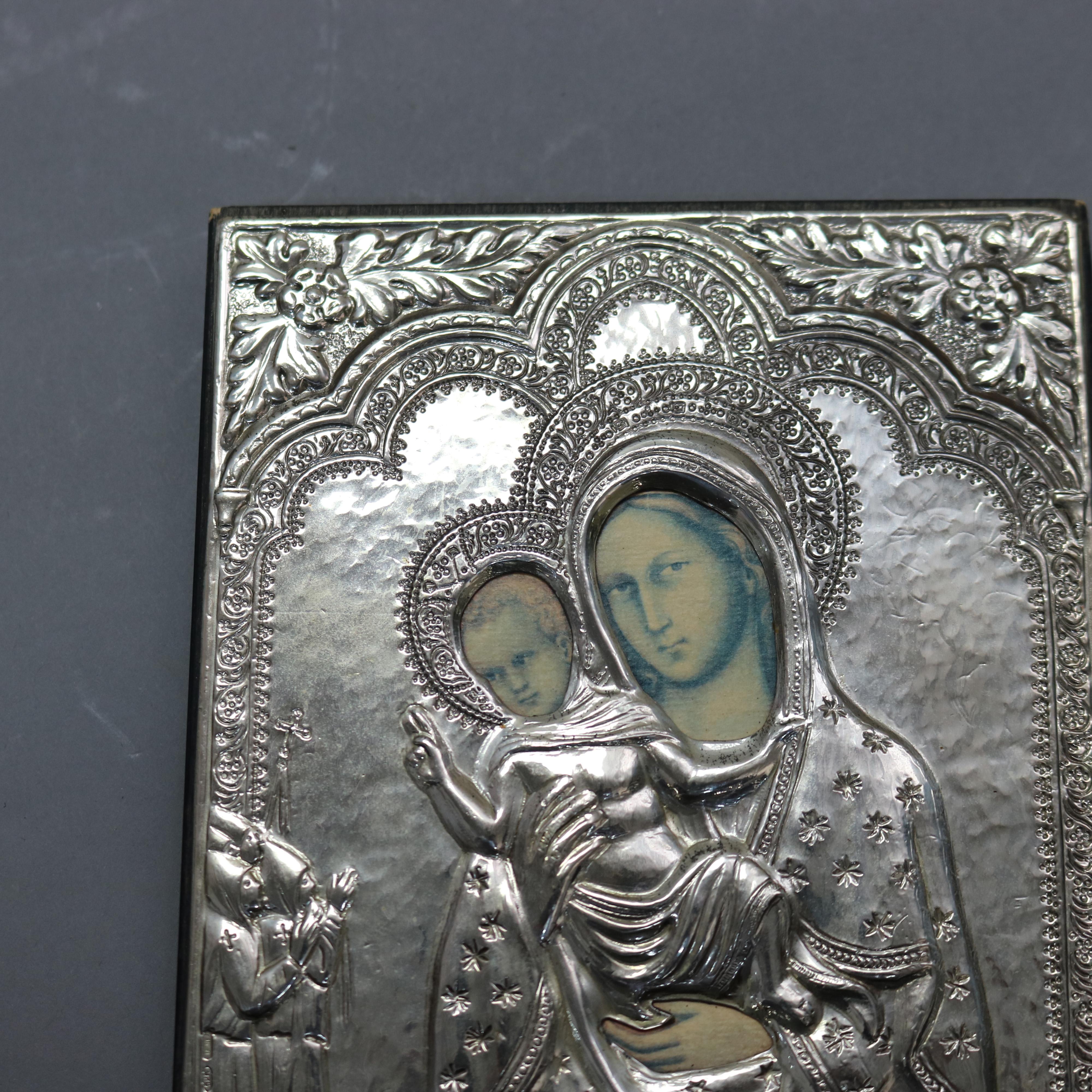 Silver Russian Icon Painting With Hall Marks 20thC

Measures- 5.75