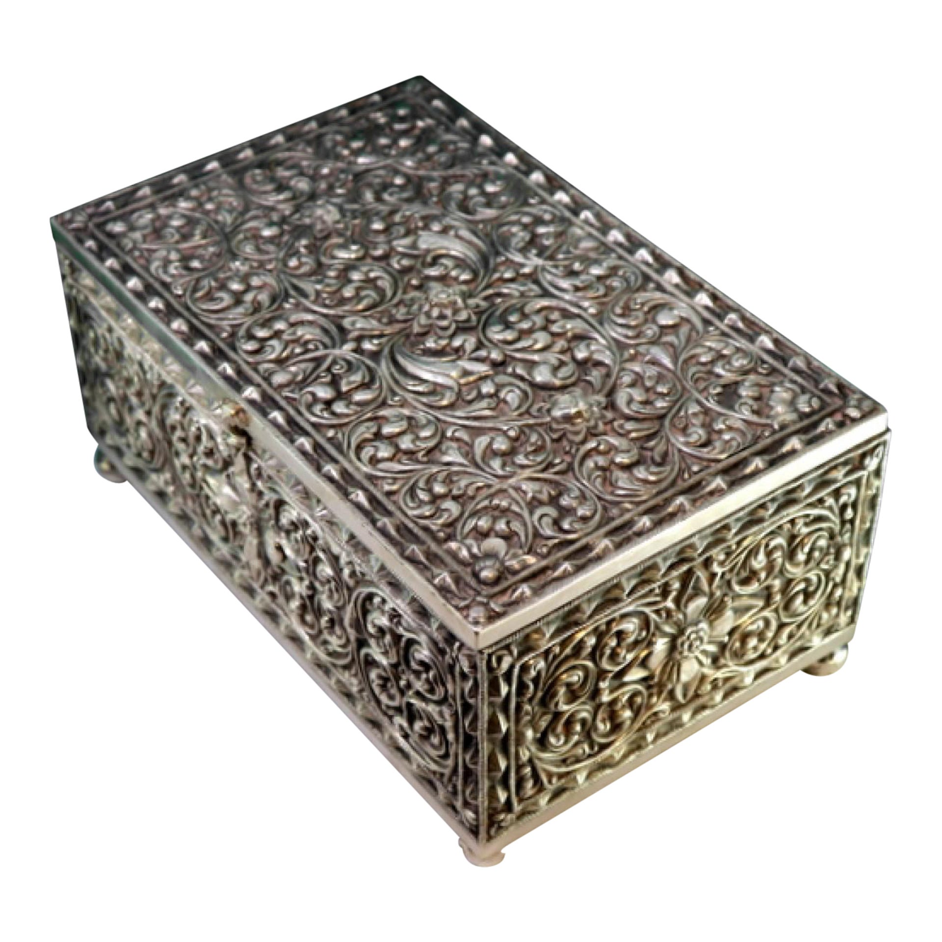 Silver safe-shaped box with floral motifs on four spherical feet