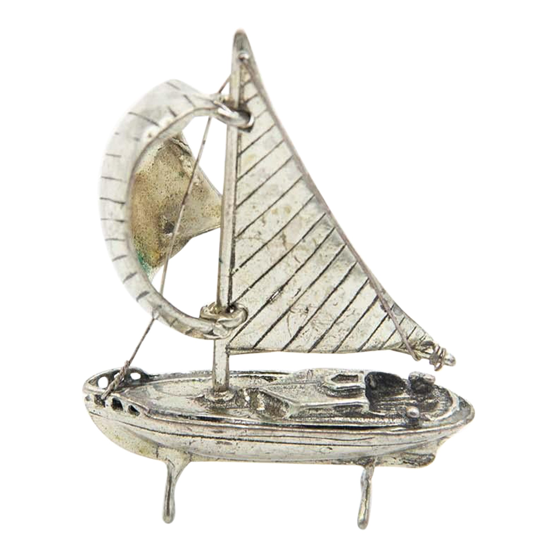 Silver sailing boat miniature