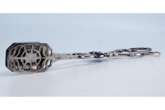 Silver salad, bread or sauce tongs