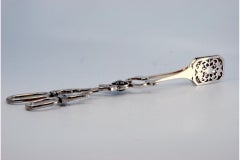 Silver salad, bread or sauce tongs