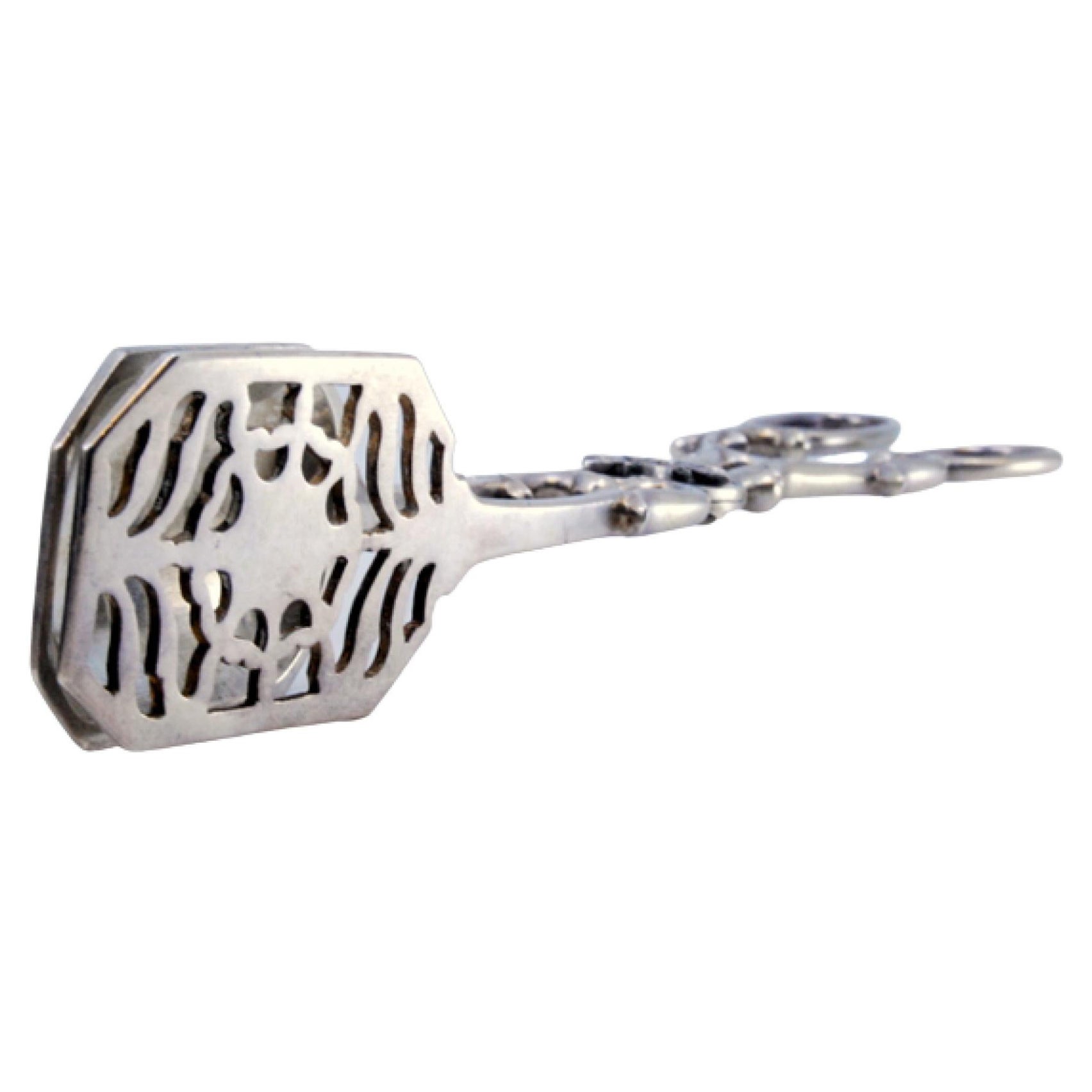 Silver salad, bread or sauce tongs