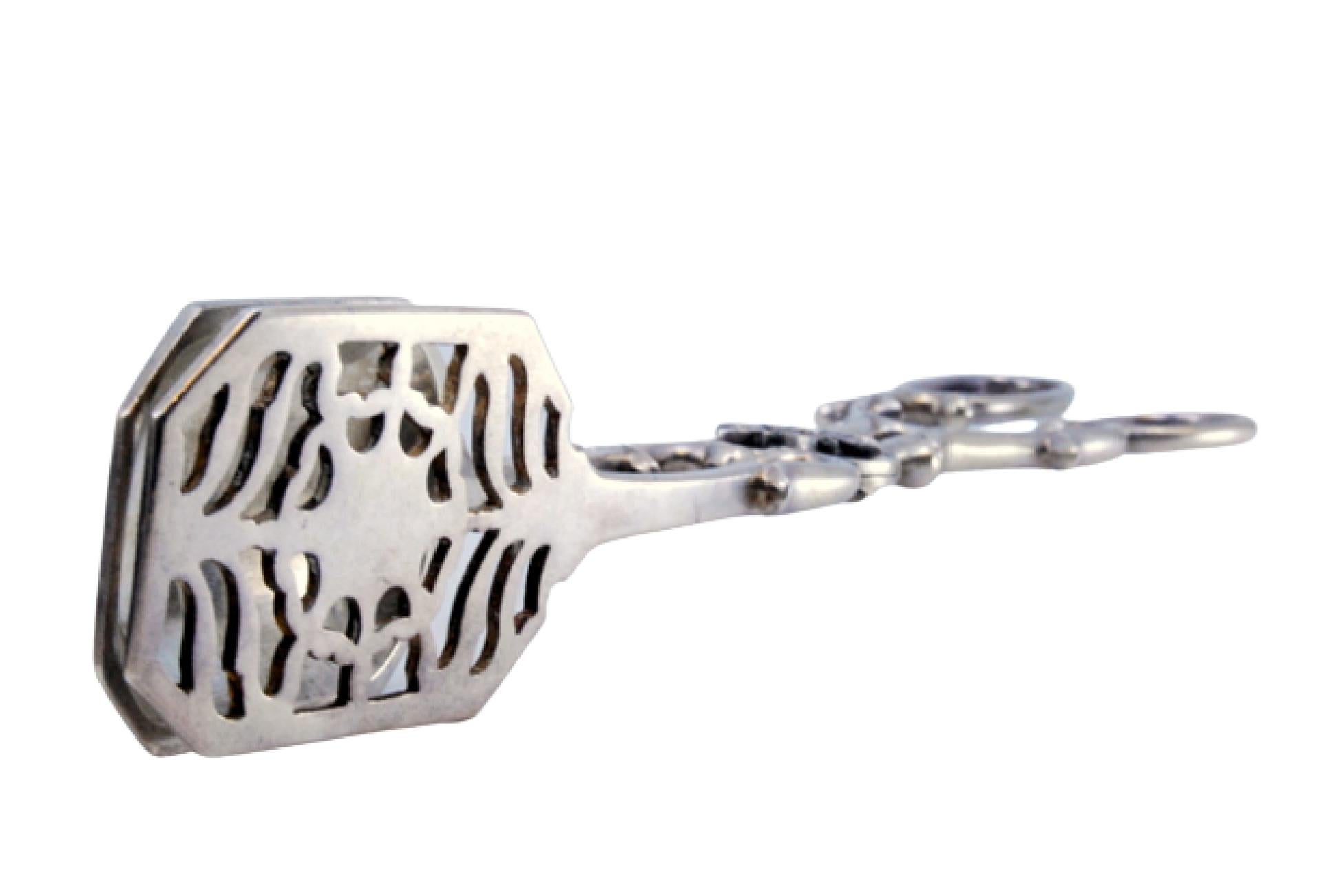 Silver salad, bread or sauce tongs