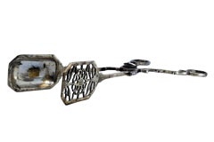 Silver salad, bread or sauce tongs with palm appliqués on the handle