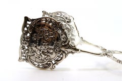 Silver salad or bread tongs