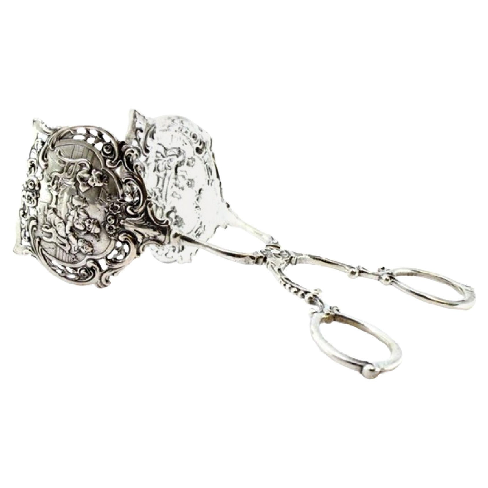 Silver salad or bread tongs