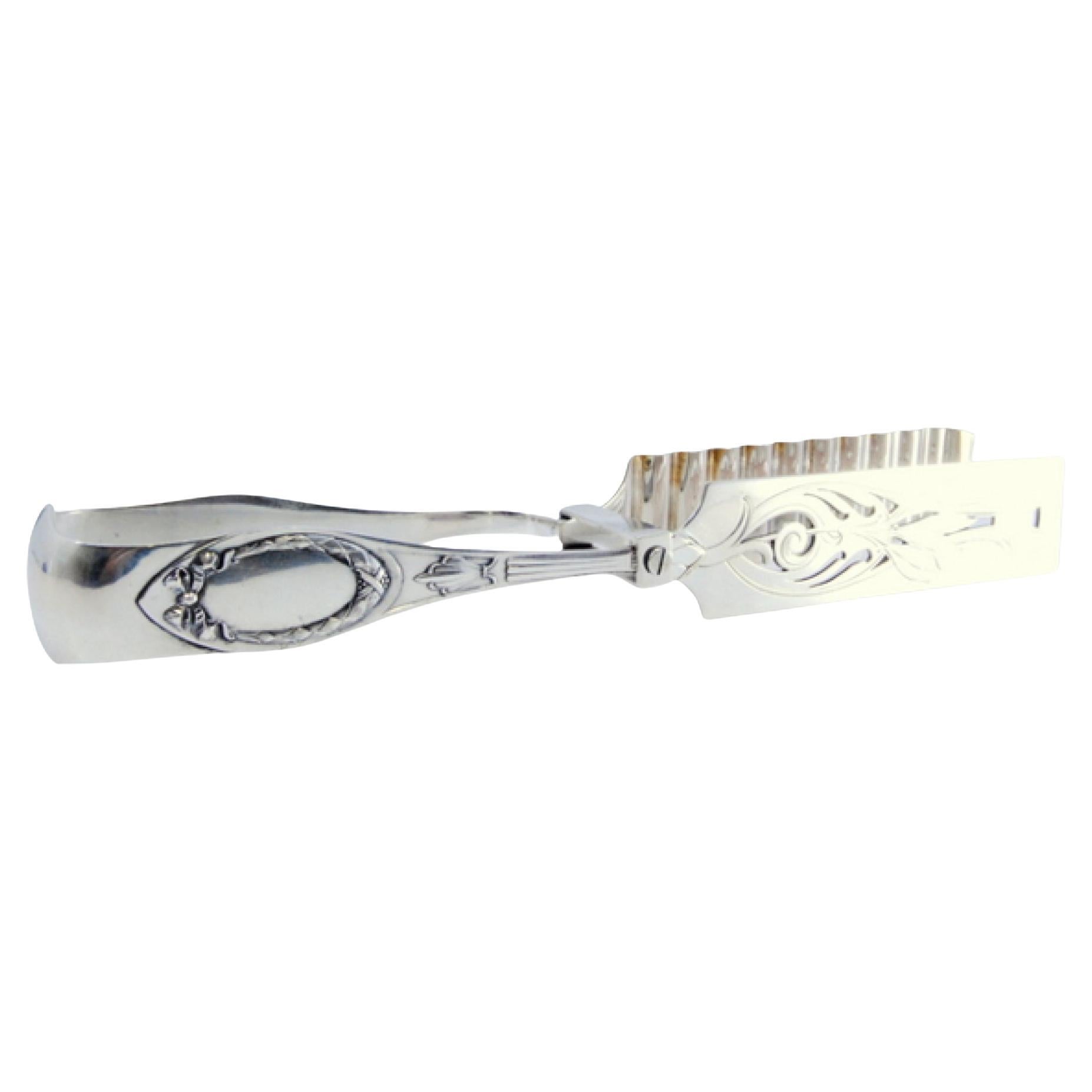 Silver salad or bread tongs