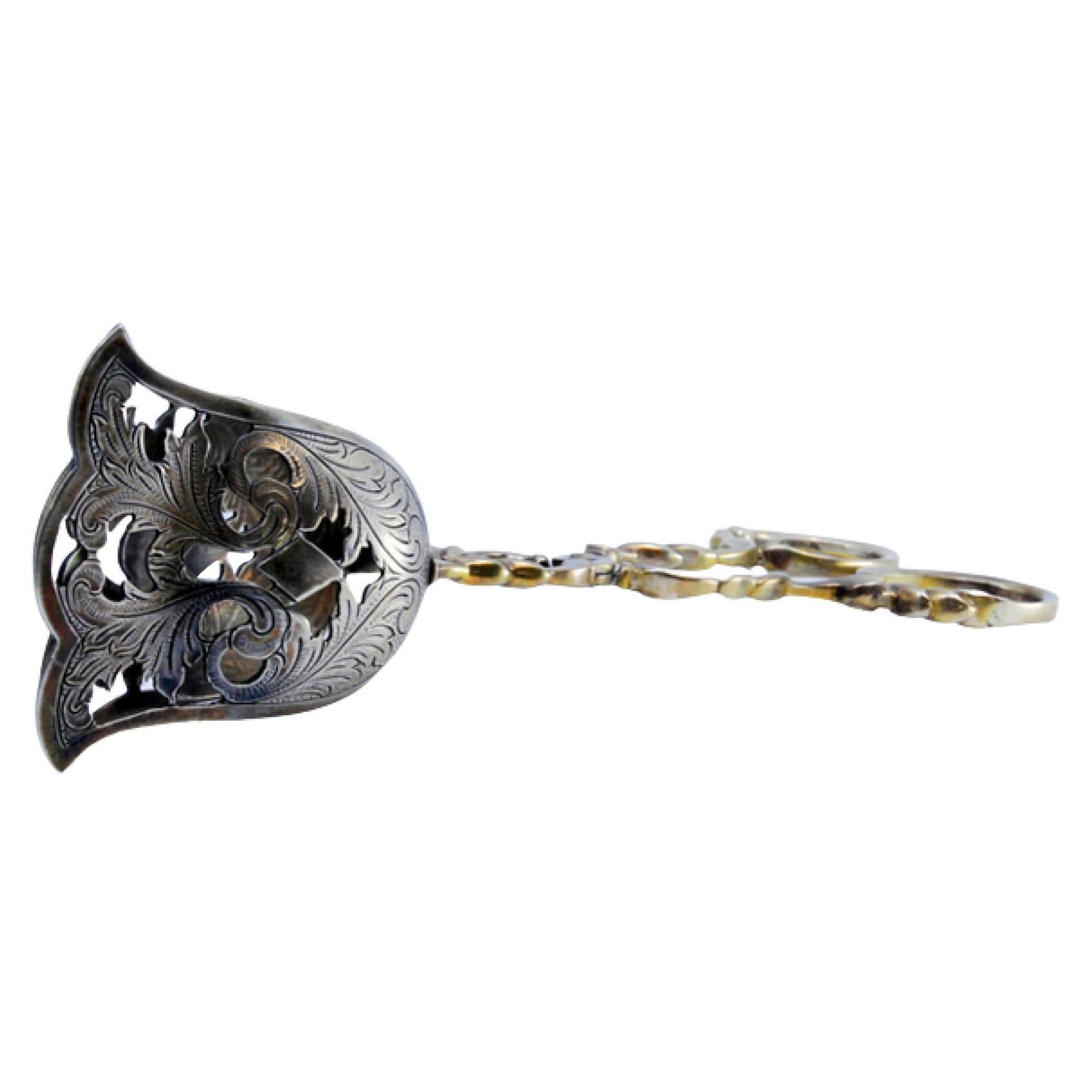 Silver salad or bread tongs with cutouts and intertwined stems