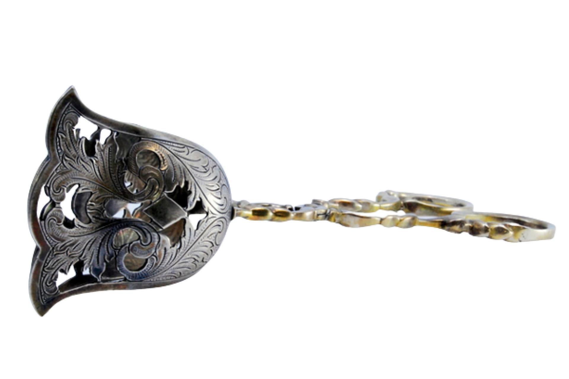 Silver salad or bread tongs with cutouts and intertwined stems For Sale