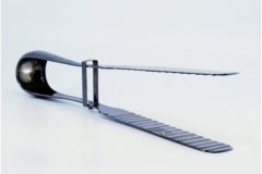 Silver salad or bread tongs with engraved floral motifs