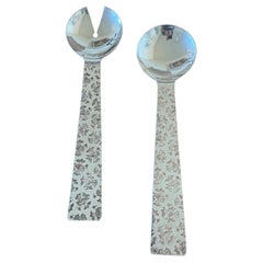 Silver Salad Tongs by Micheal Graves for  Swid Powell and Reed & Barton