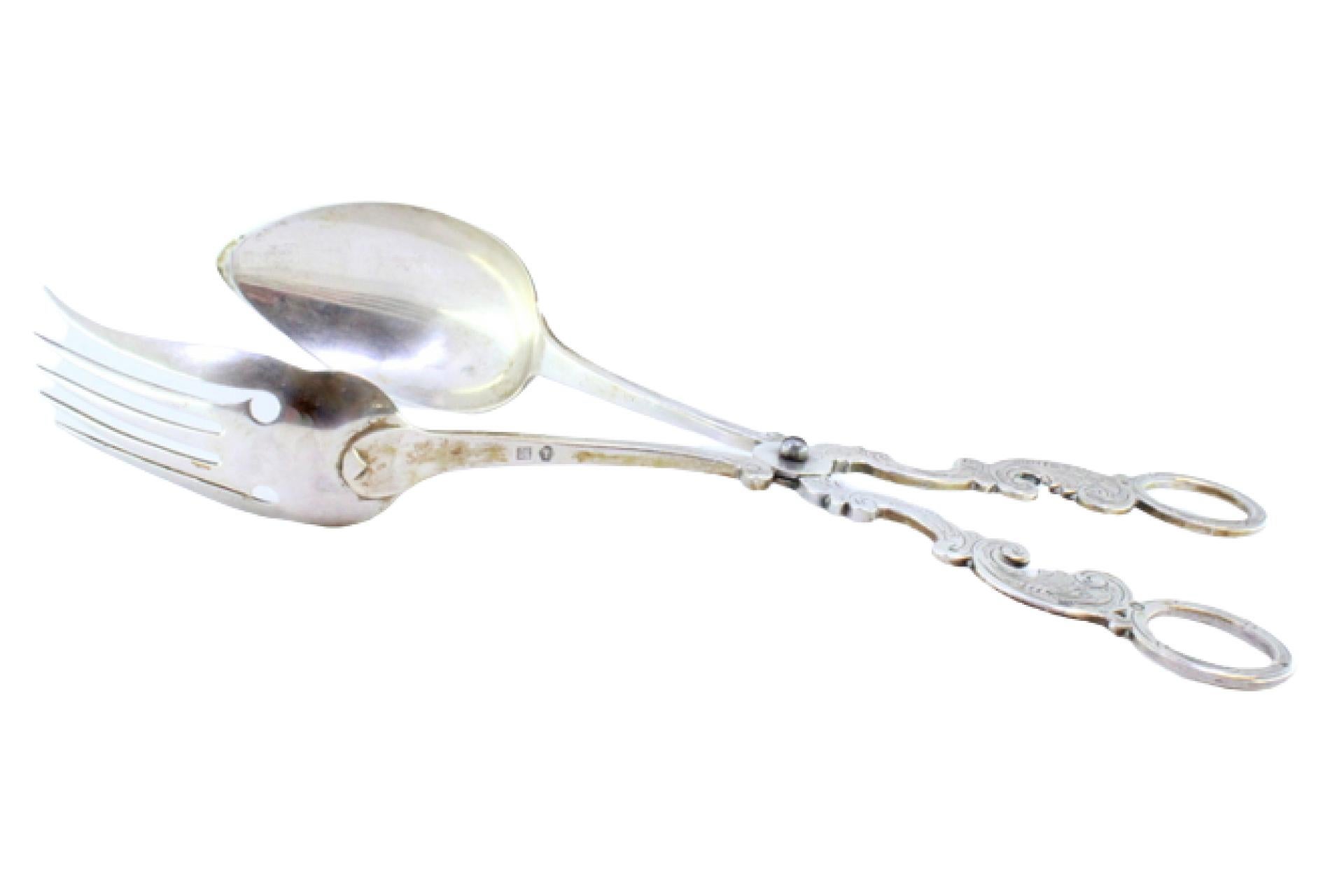 Silver salad tongs with spoon and fork embossed on the handles For Sale