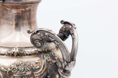 Silver samovar with engraving and four support legs