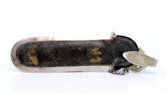 Silver scissors holder with reliefs, Putti, chain, and monogram card