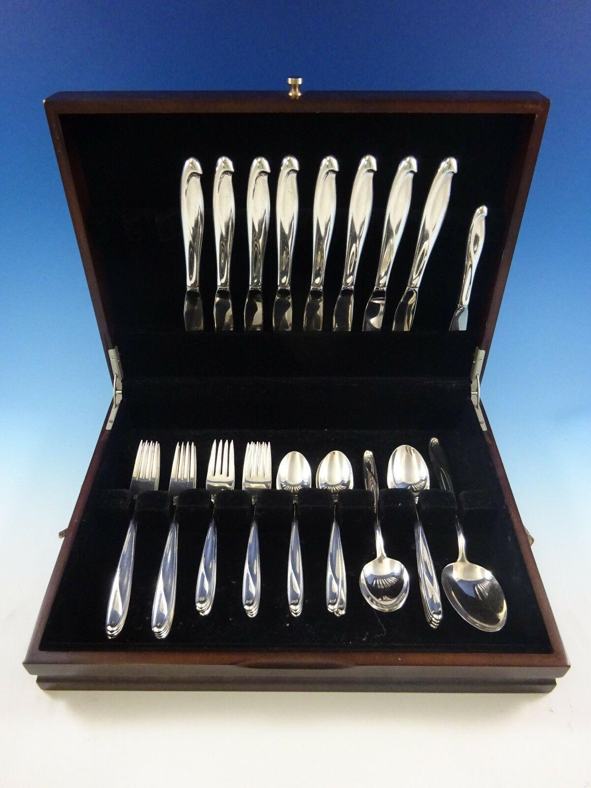Sculpture en argent de style Mid-Century Modern de Reed and Barton Ensemble de couverts en argent sterling, 42 pièces. Cet ensemble comprend :

8 couteaux, 9