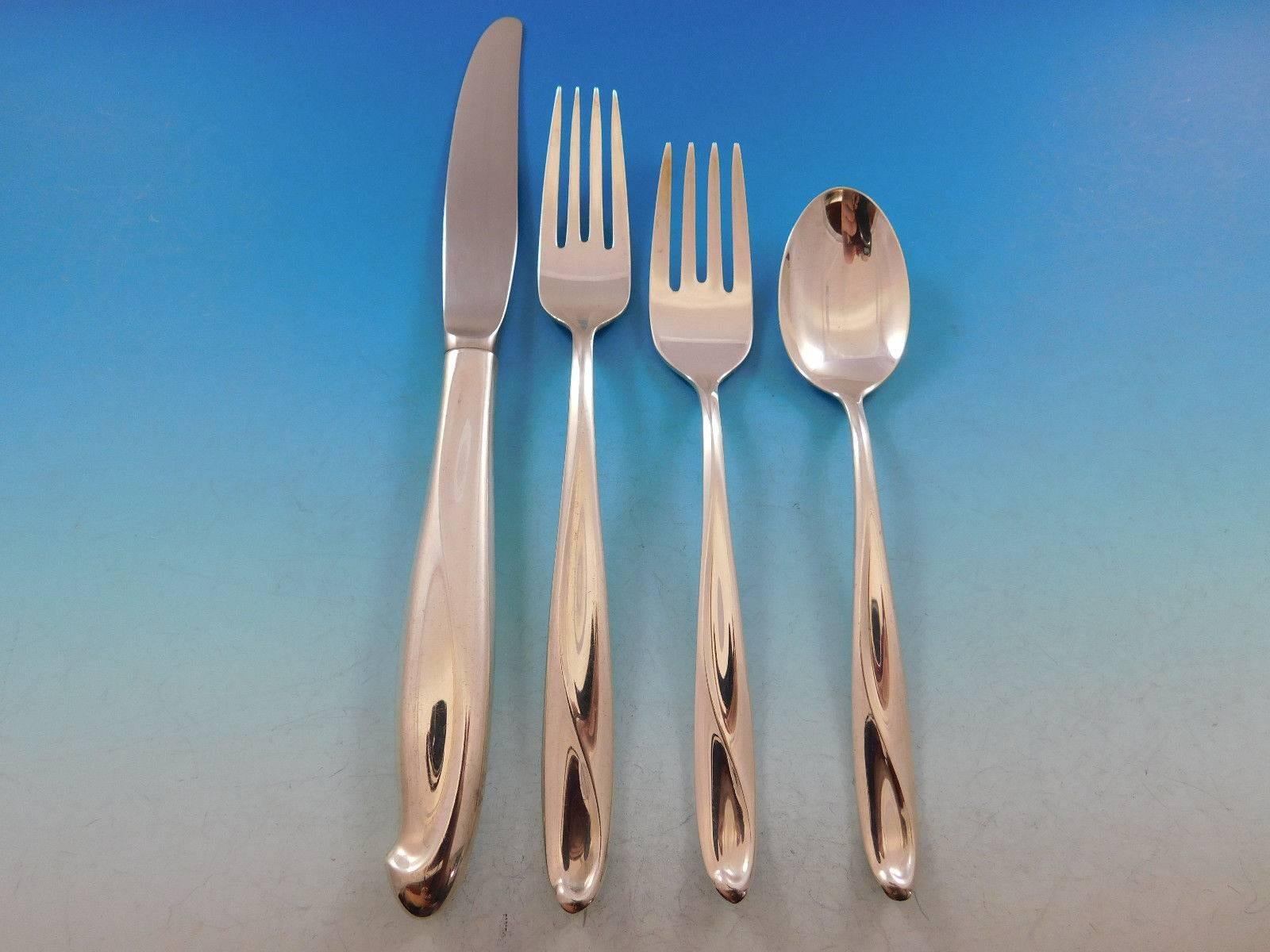 Mid-Century Modern silver sculpture by Reed and Barton sterling silver flatware set, 36 pieces. See photo of Reed & Barton's 1954 advertisement, as illustrated in Modernism in American Silver by Stern book. Great starter set! This set includes:

Six