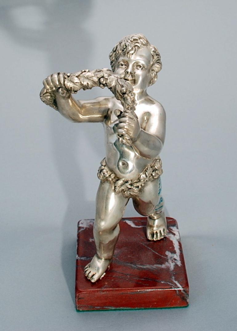 Silver Sculpture Figure of Cherub with Garland of Flowers on Marble Base In Good Condition For Sale In New York, NY