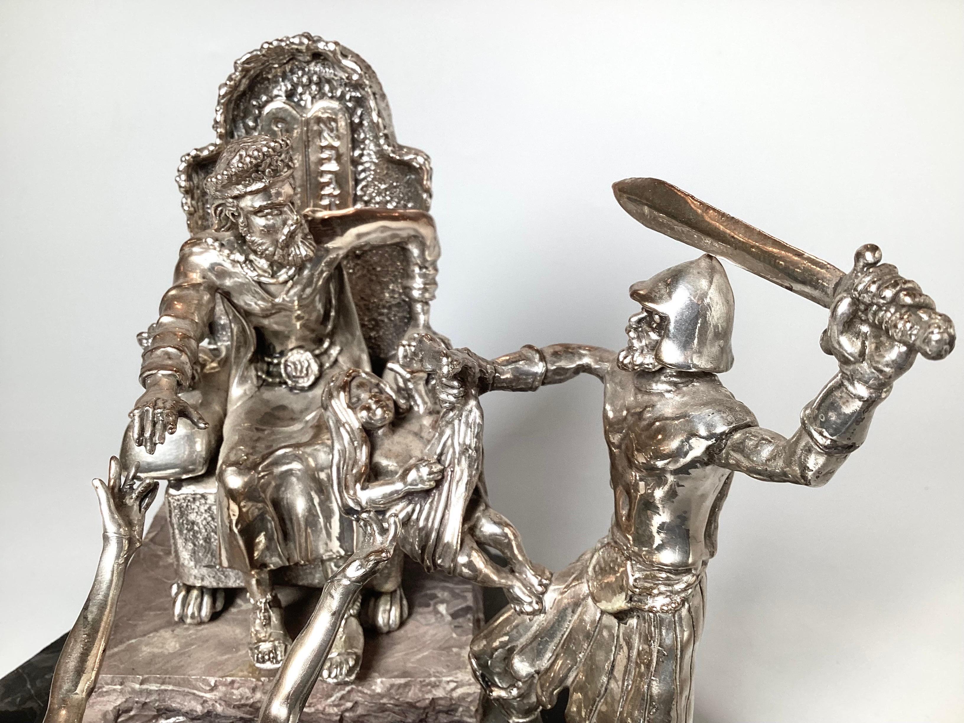 A fine silver sculpture depicting the biblical story of The Judgement of King Solomon. Excellent detail throughout, signed on base with plaque with certificate of authenticity and original invoice from 1973 for $1240, equal to around $8000 in today
