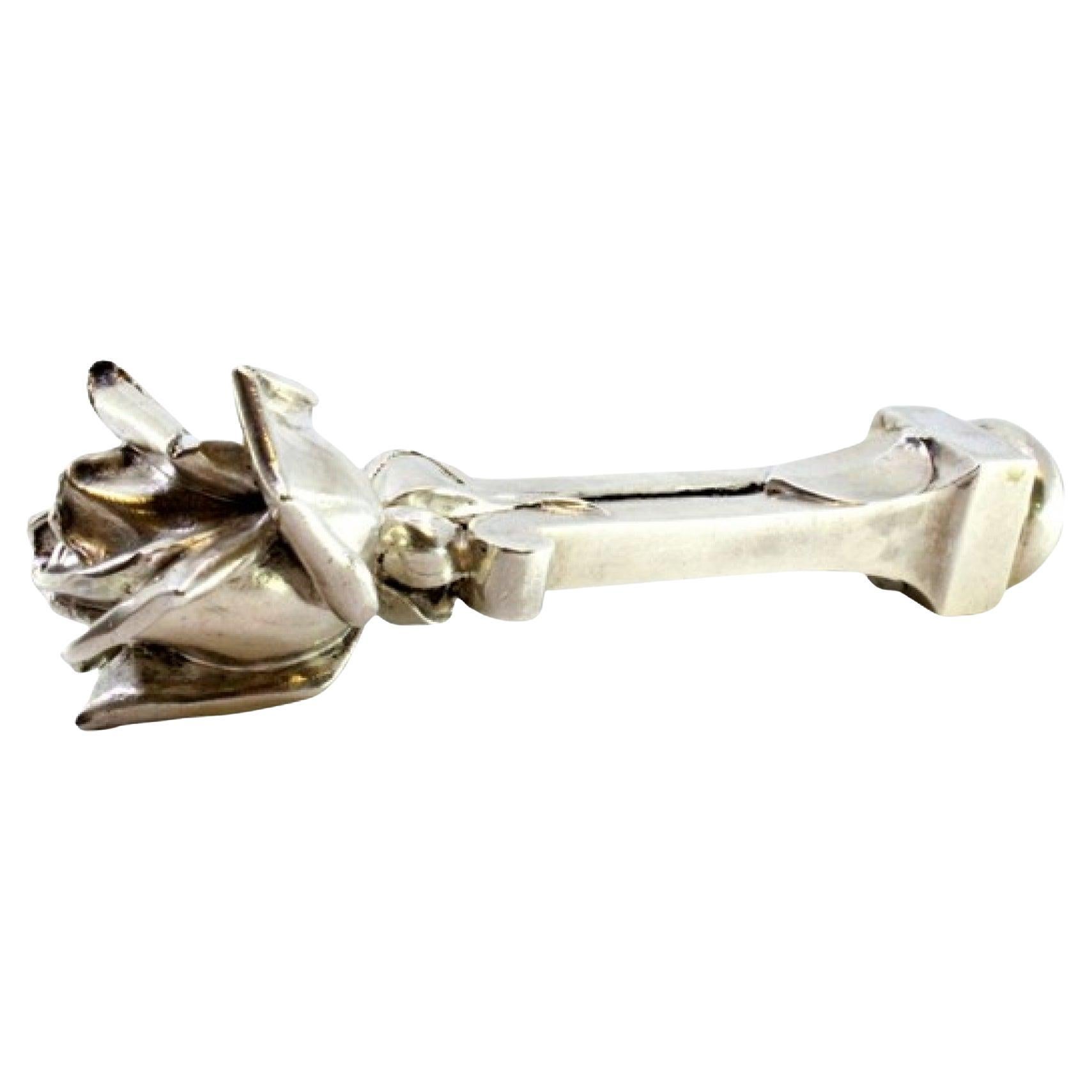 Silver seal w/ flower at the top on a column w/ a square base 
coat of arms For Sale