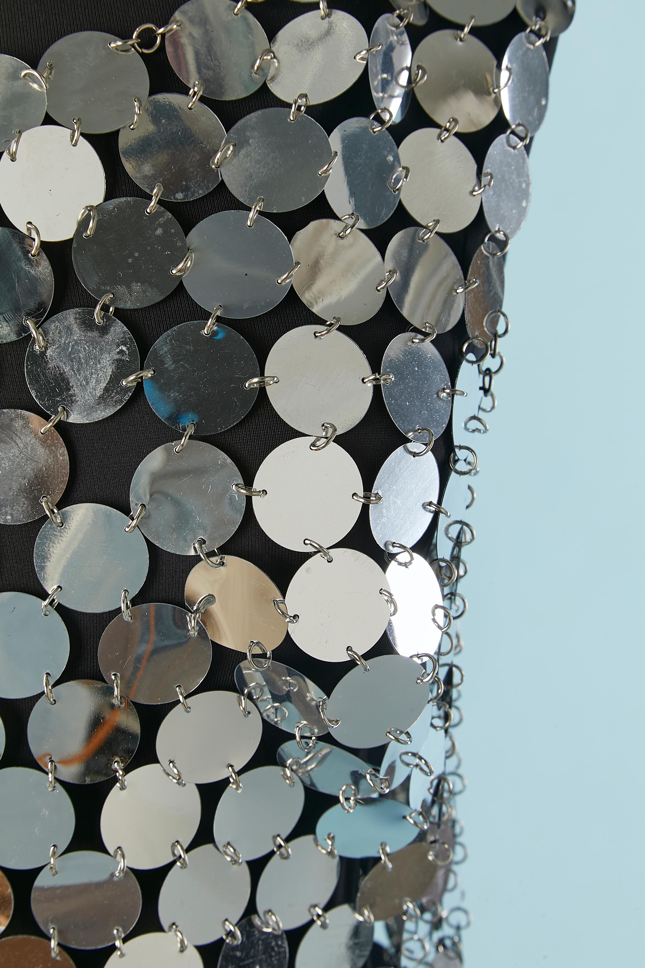 Silver sequin cocktail dress with silver metal ring. Breast shaped. 
SIZE M 
