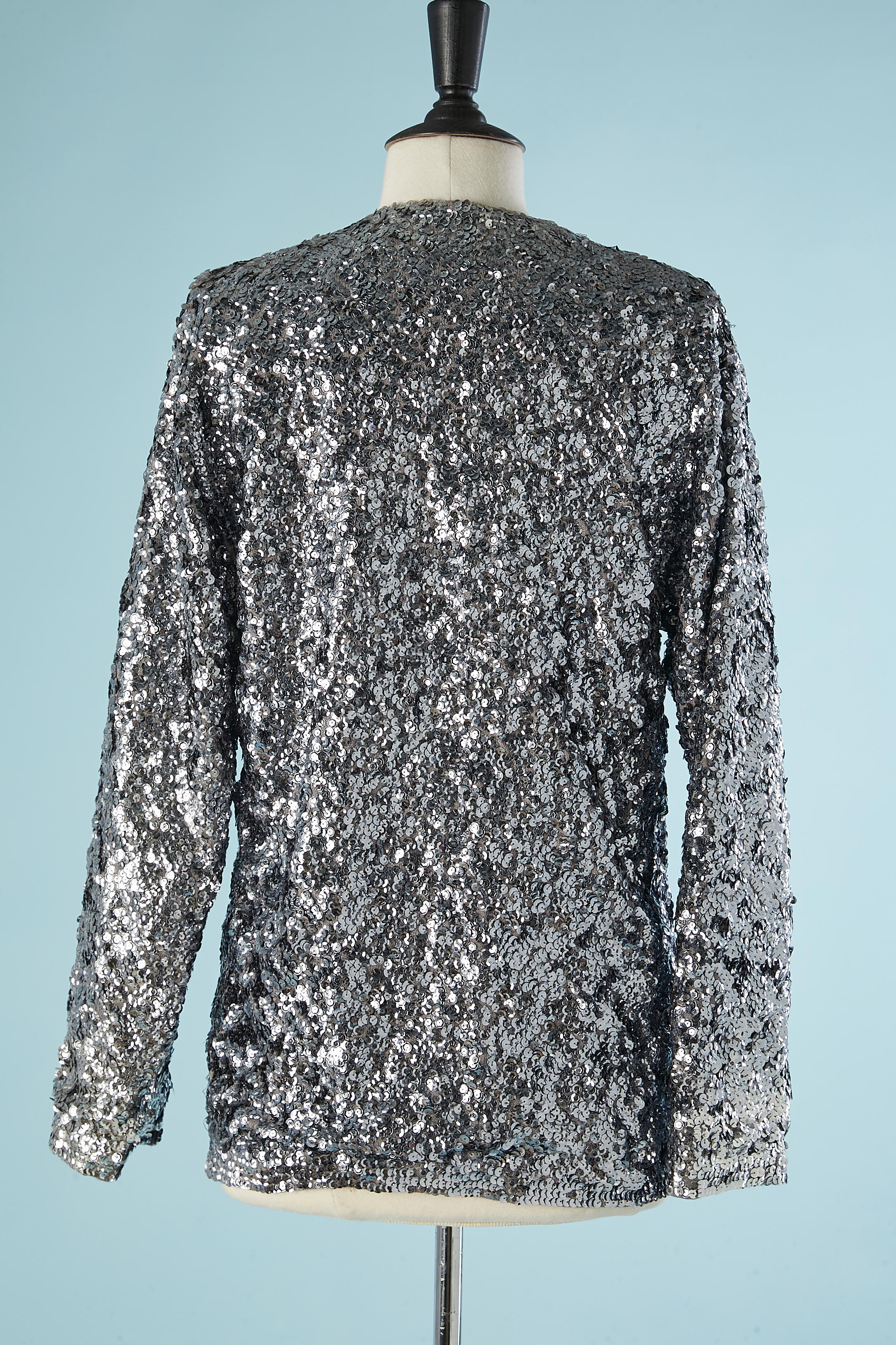 Women's Silver sequin edge to edge evening jacket on a grey knit base Circa 1970's For Sale